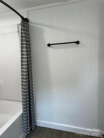 a view of a storage & utility room with a window