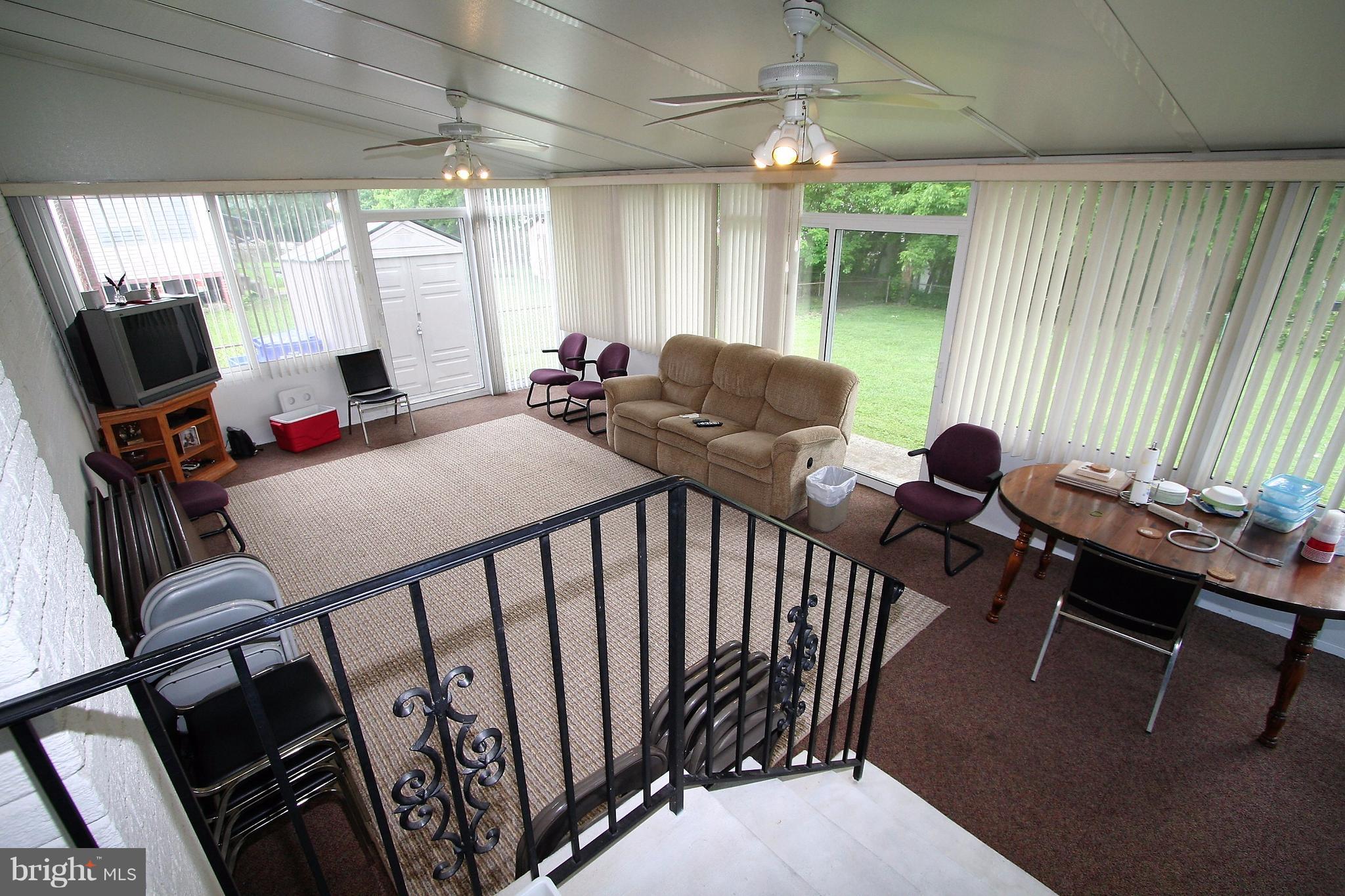 12720 Gould Road Silver Spring, MD 20906 - Photo 14 of 30 a view of a dining room with furniture window and outside view