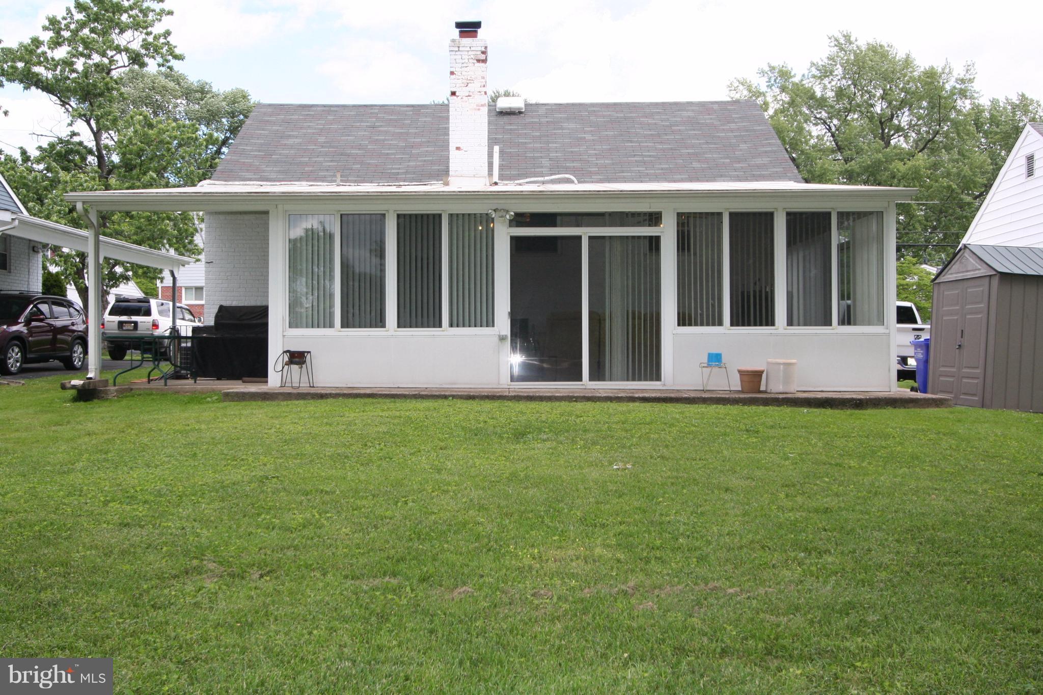 12720 Gould Road Silver Spring, MD 20906 - Photo 29 of 30 a front view of house with yard and green space