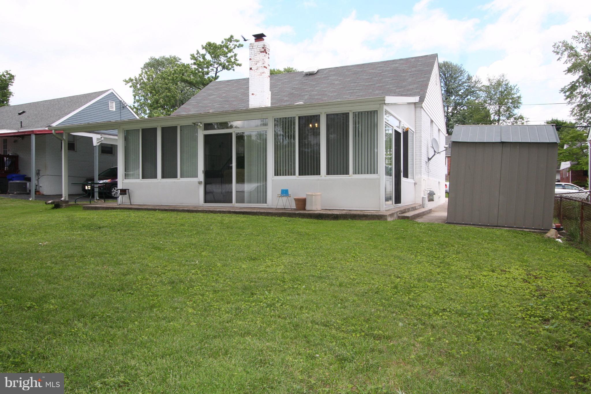12720 Gould Road Silver Spring, MD 20906 - Photo 30 of 30 front view of a house with a yard