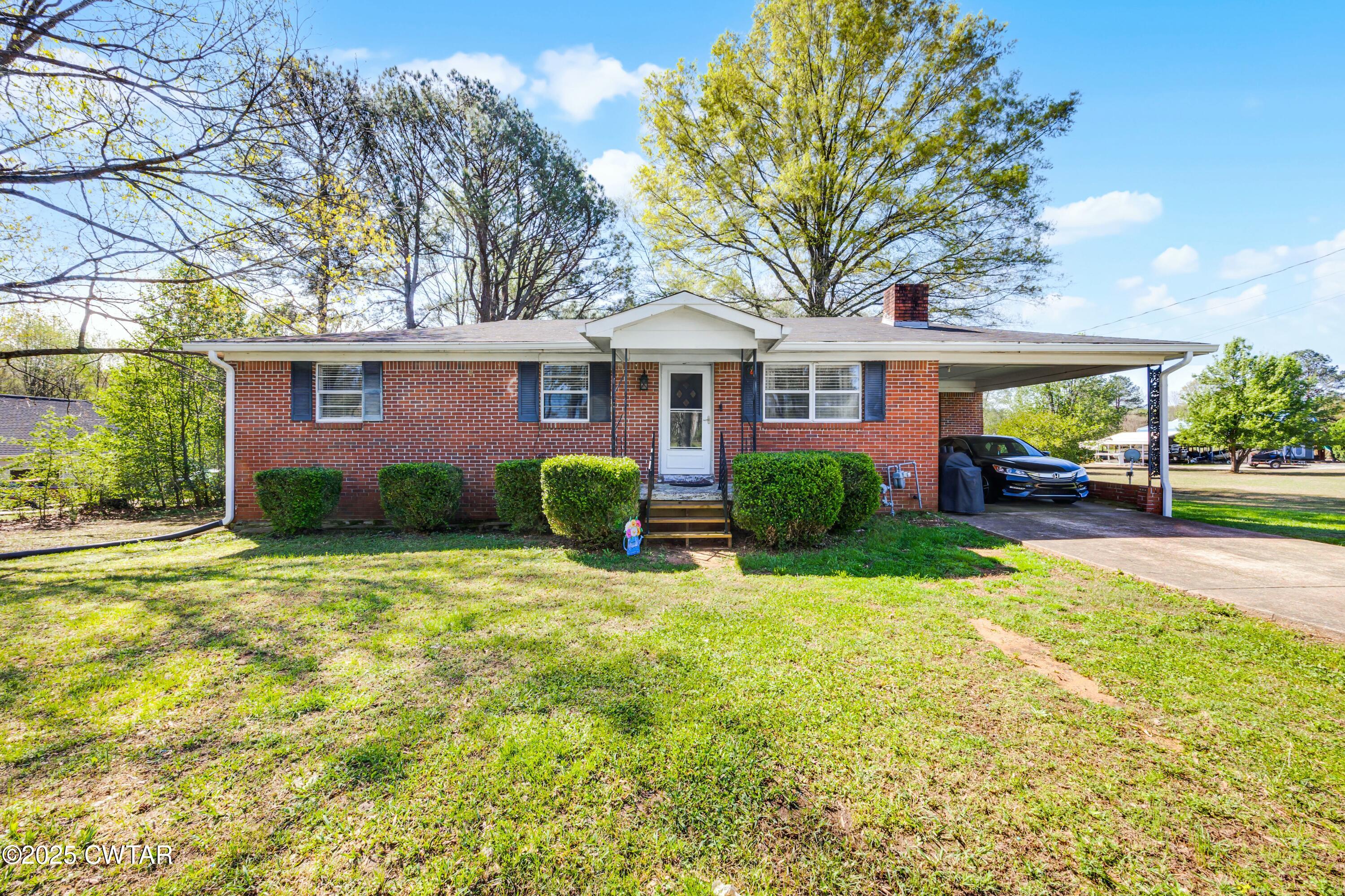 a house view with a garden space