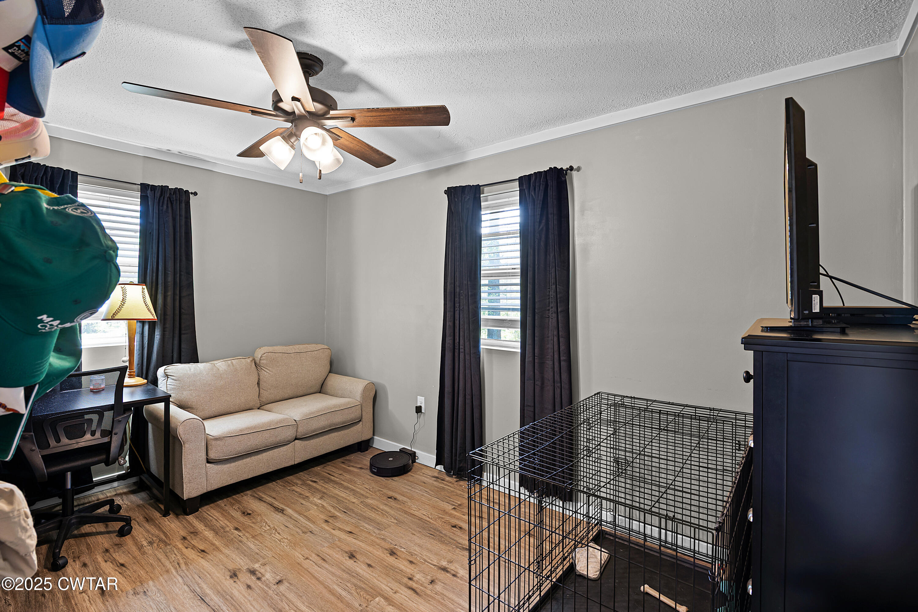 34 Hughes Loop Milan, TN 38358 - Photo 11 of 21 a bedroom with furniture and a window