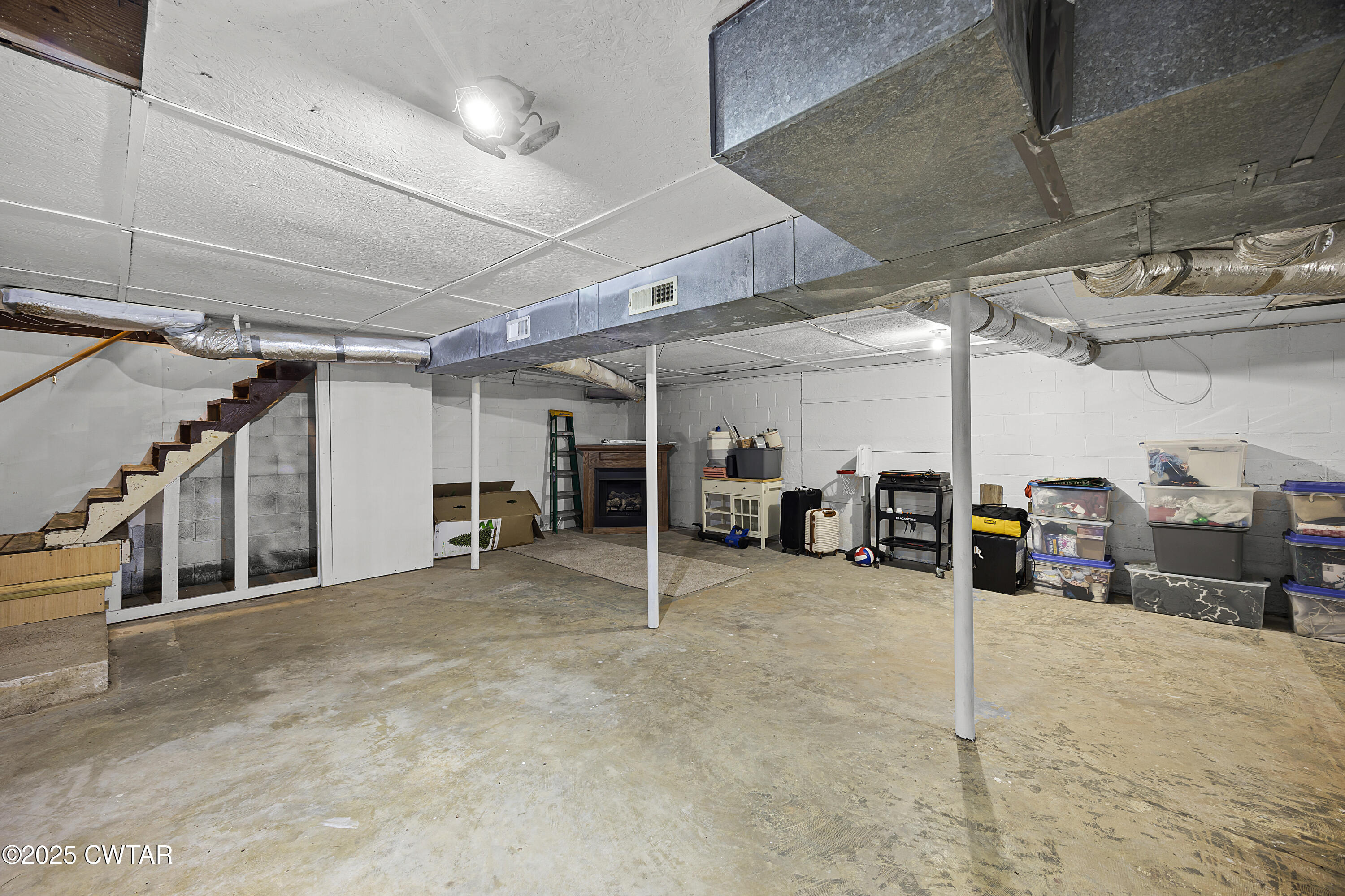 34 Hughes Loop Milan, TN 38358 - Photo 15 of 21 a view of a garage with storage