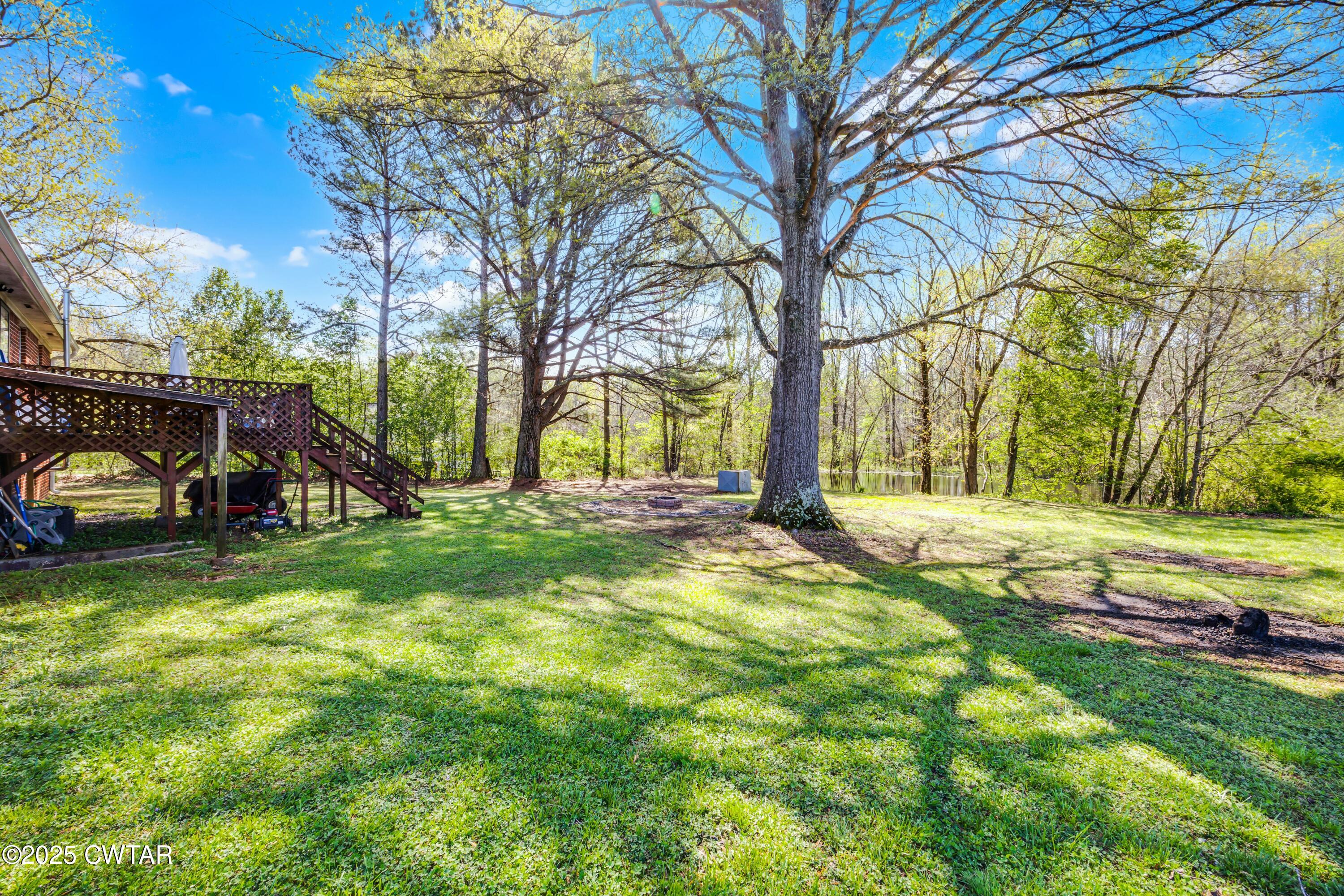 34 Hughes Loop Milan, TN 38358 - Photo 17 of 21 a view of a park with large trees