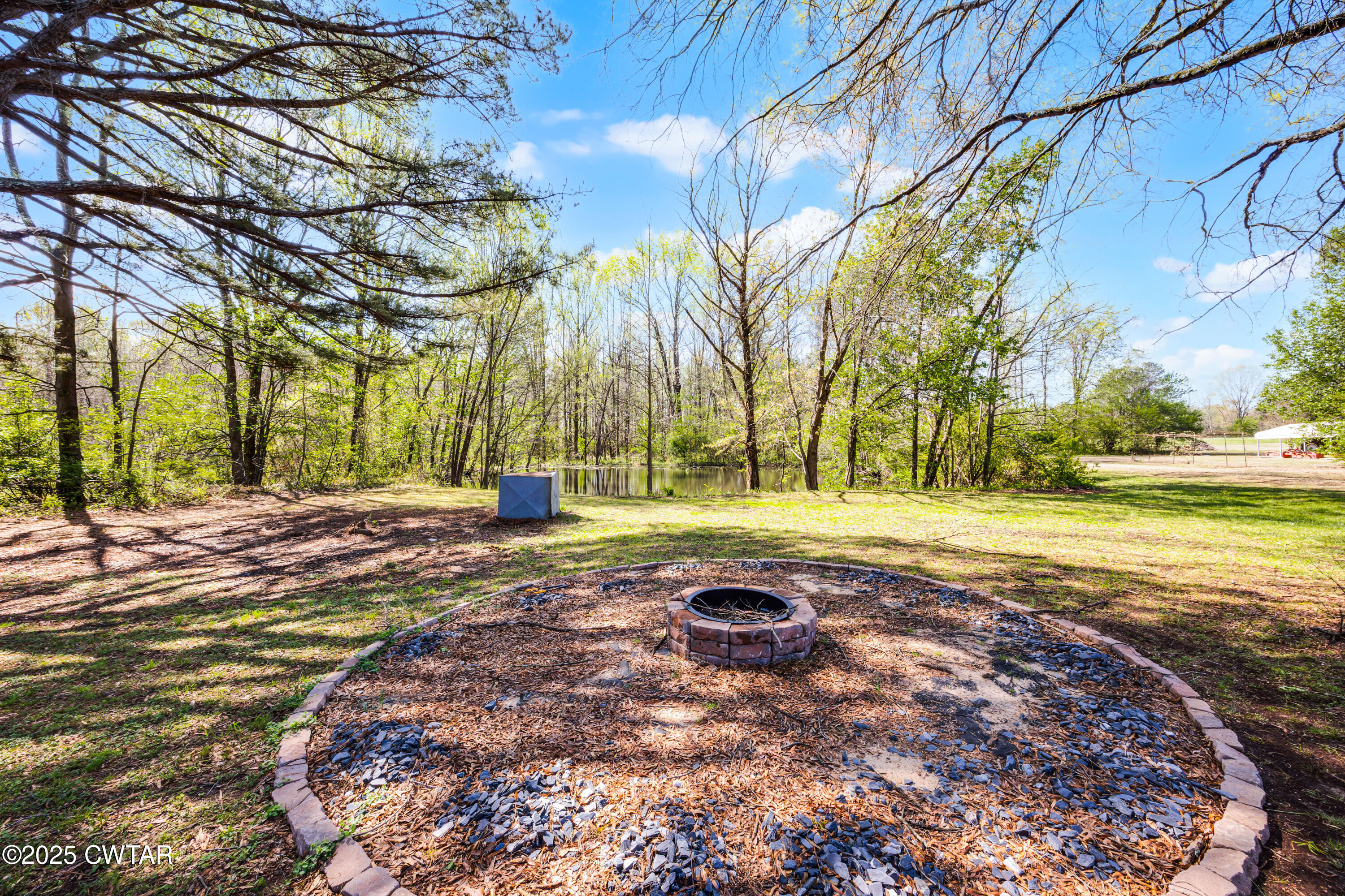 34 Hughes Loop Milan, TN 38358 - Photo 18 of 21 a view of yard with swimming pool