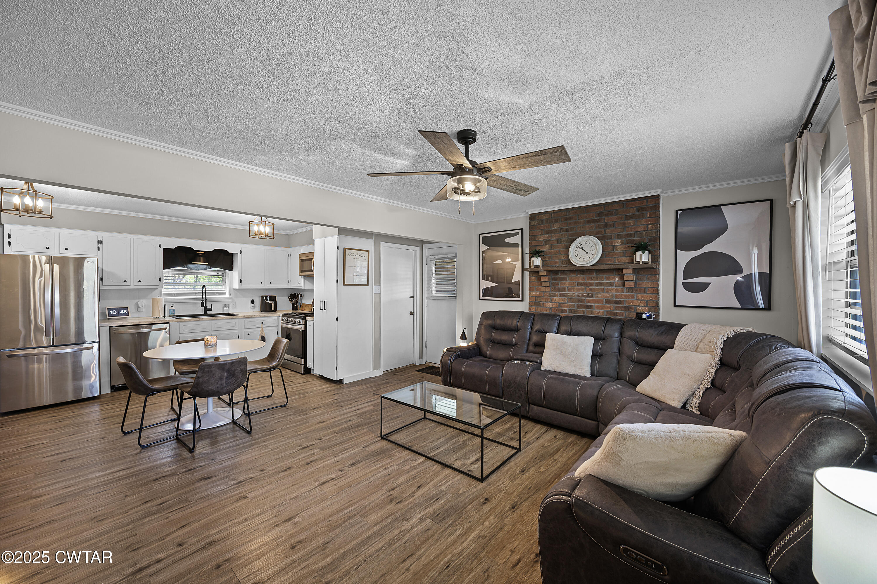 34 Hughes Loop Milan, TN 38358 - Photo 5 of 21 a living room with furniture kitchen view and a window