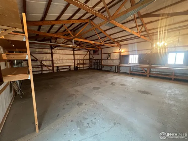 a view of a room with wooden walls