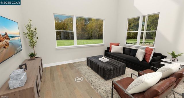 a living room with furniture and a window