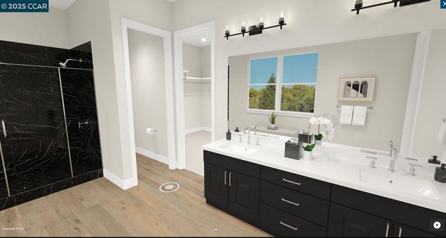 a spacious bathroom with a double vanity sink a large mirror and a shower