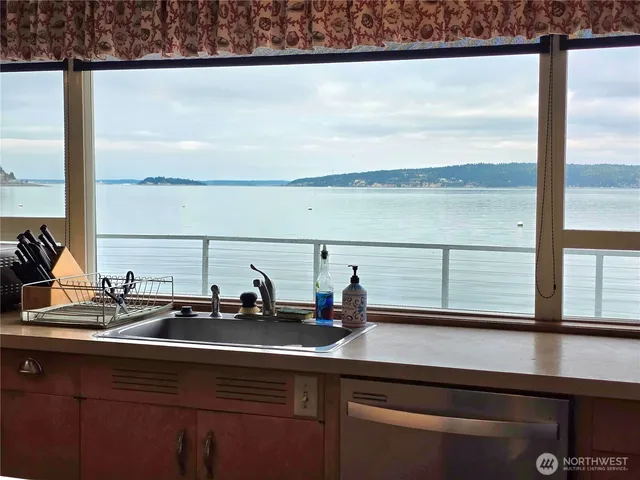 a sink with a lake view