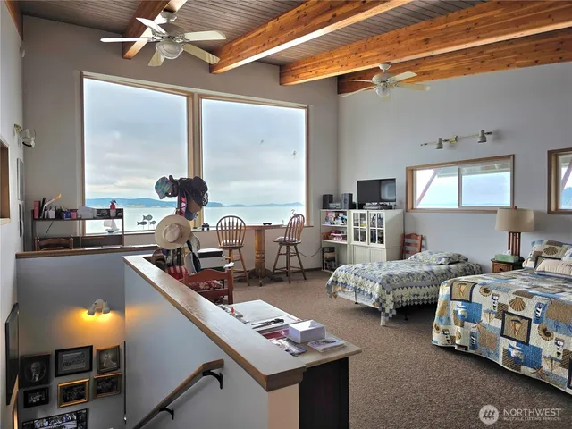 a room with furniture and a chandelier