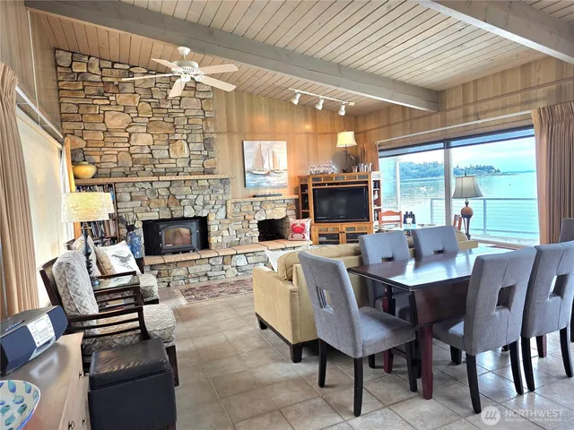 a view of a dining room with furniture window and outside view