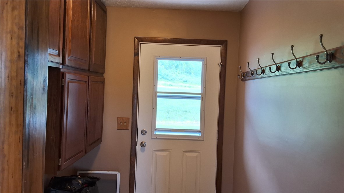 7516 Beach Road Montezuma, NY 13021 - Photo 12 of 44 Mud Room.Side Entry