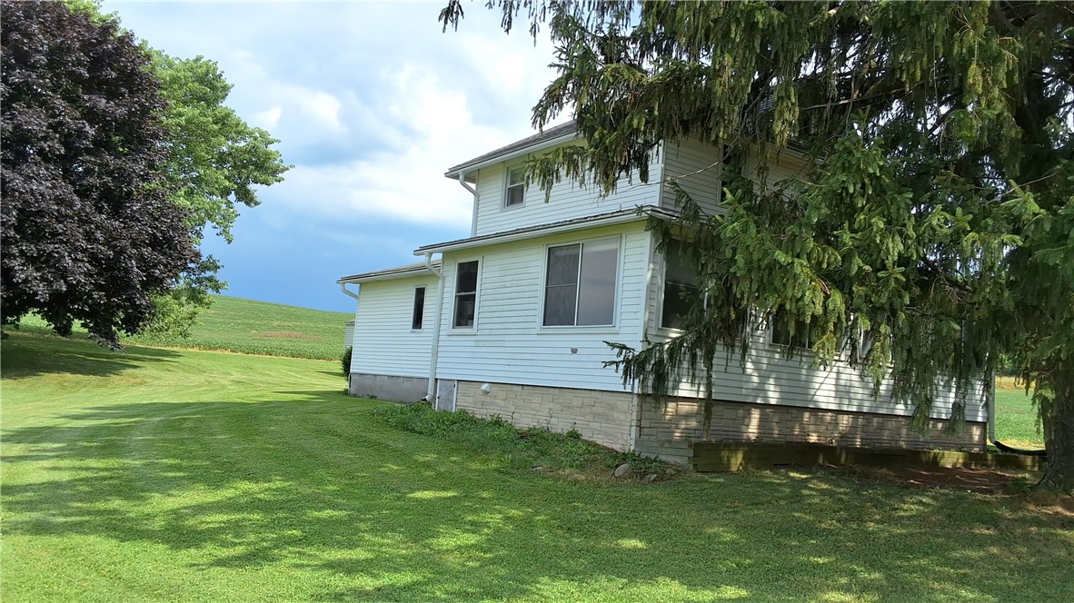 7516 Beach Road Montezuma, NY 13021 - Photo 4 of 44 Side View