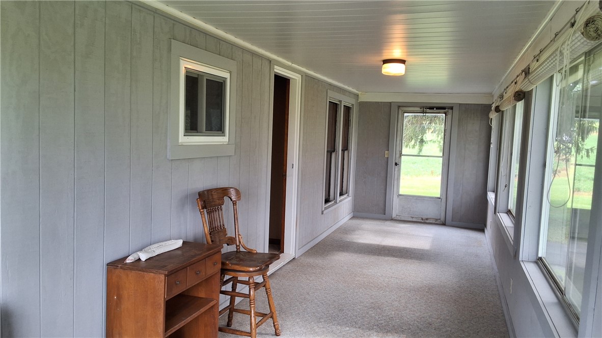 7516 Beach Road Montezuma, NY 13021 - Photo 9 of 44 Enclosed Front Porch