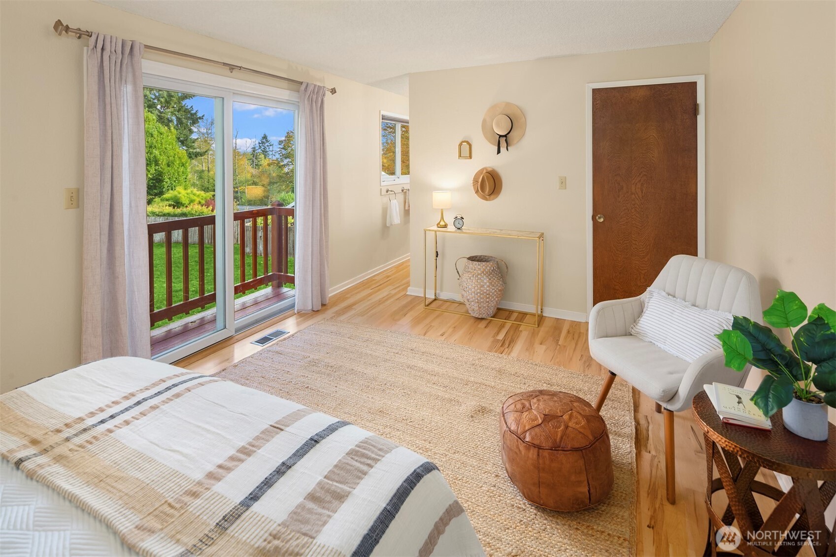 10514 Southwest 110th Street Vashon, WA 98070 - Photo 15 of 38 a bedroom with a bed and a window