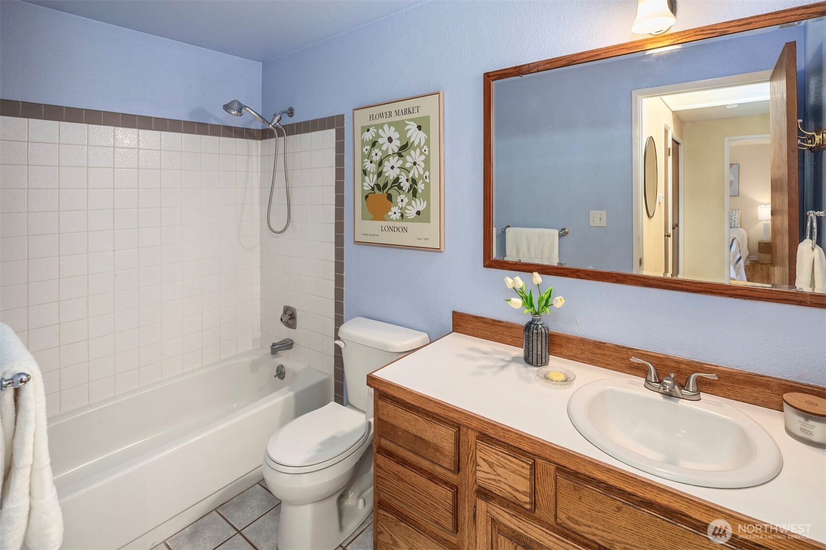 10514 Southwest 110th Street Vashon, WA 98070 - Photo 20 of 38 a bathroom with a sink toilet and shower