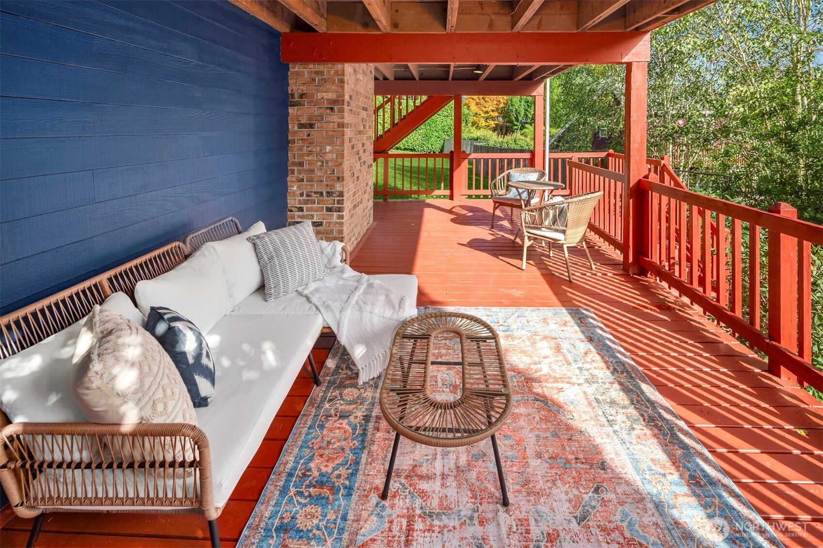 10514 Southwest 110th Street Vashon, WA 98070 - Photo 29 of 38 a living room with furniture and a floor to ceiling window