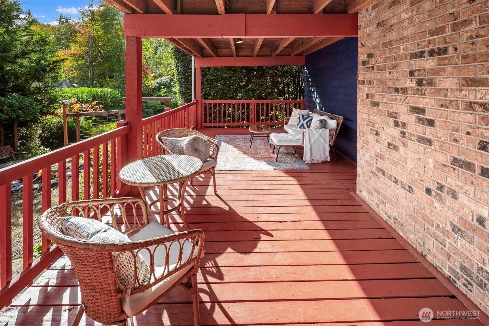 10514 Southwest 110th Street Vashon, WA 98070 - Photo 31 of 38 a balcony with table and chairs