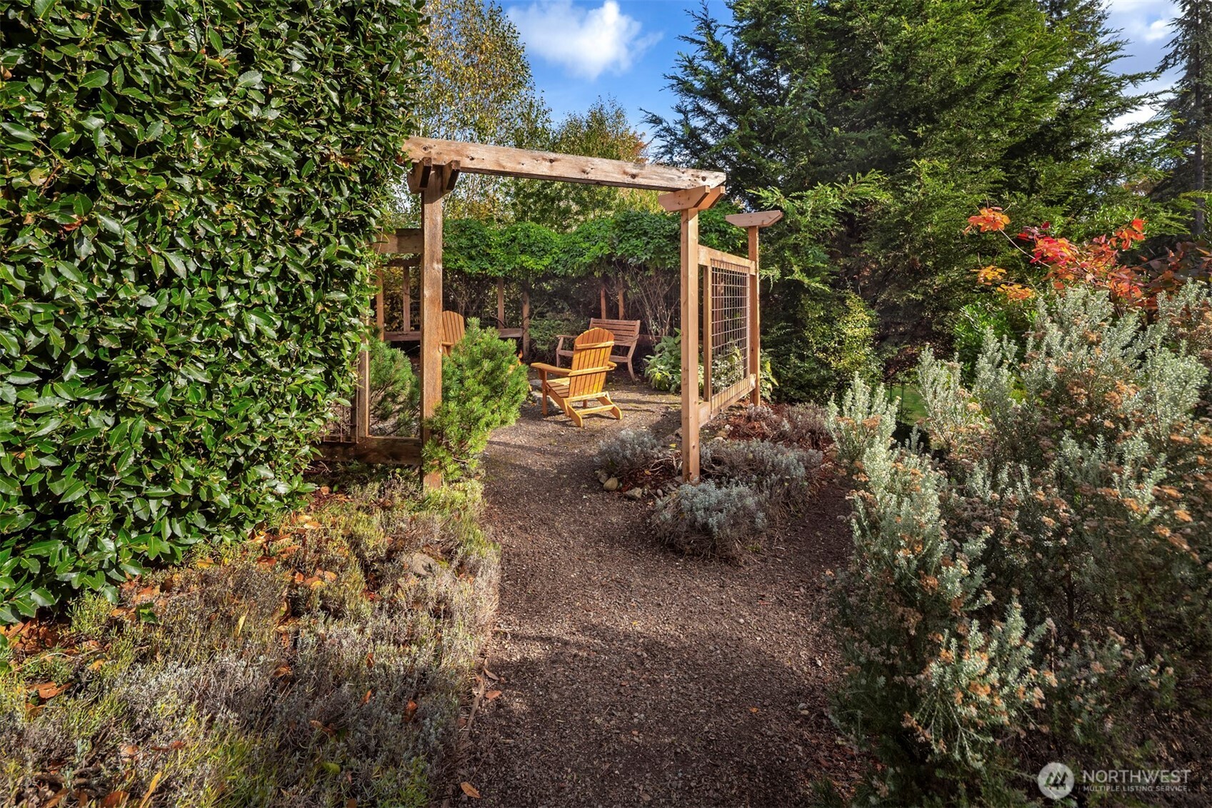10514 Southwest 110th Street Vashon, WA 98070 - Photo 32 of 38 a view of a backyard with sitting area