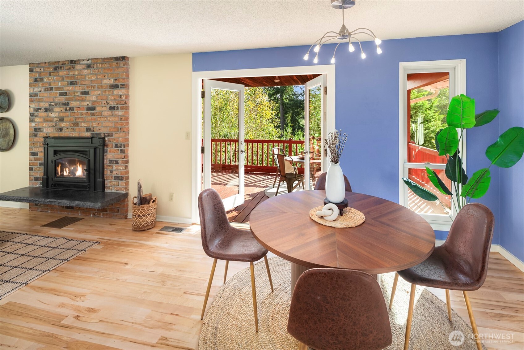 10514 Southwest 110th Street Vashon, WA 98070 - Photo 8 of 38 a view of a dining room with furniture window and wooden floor