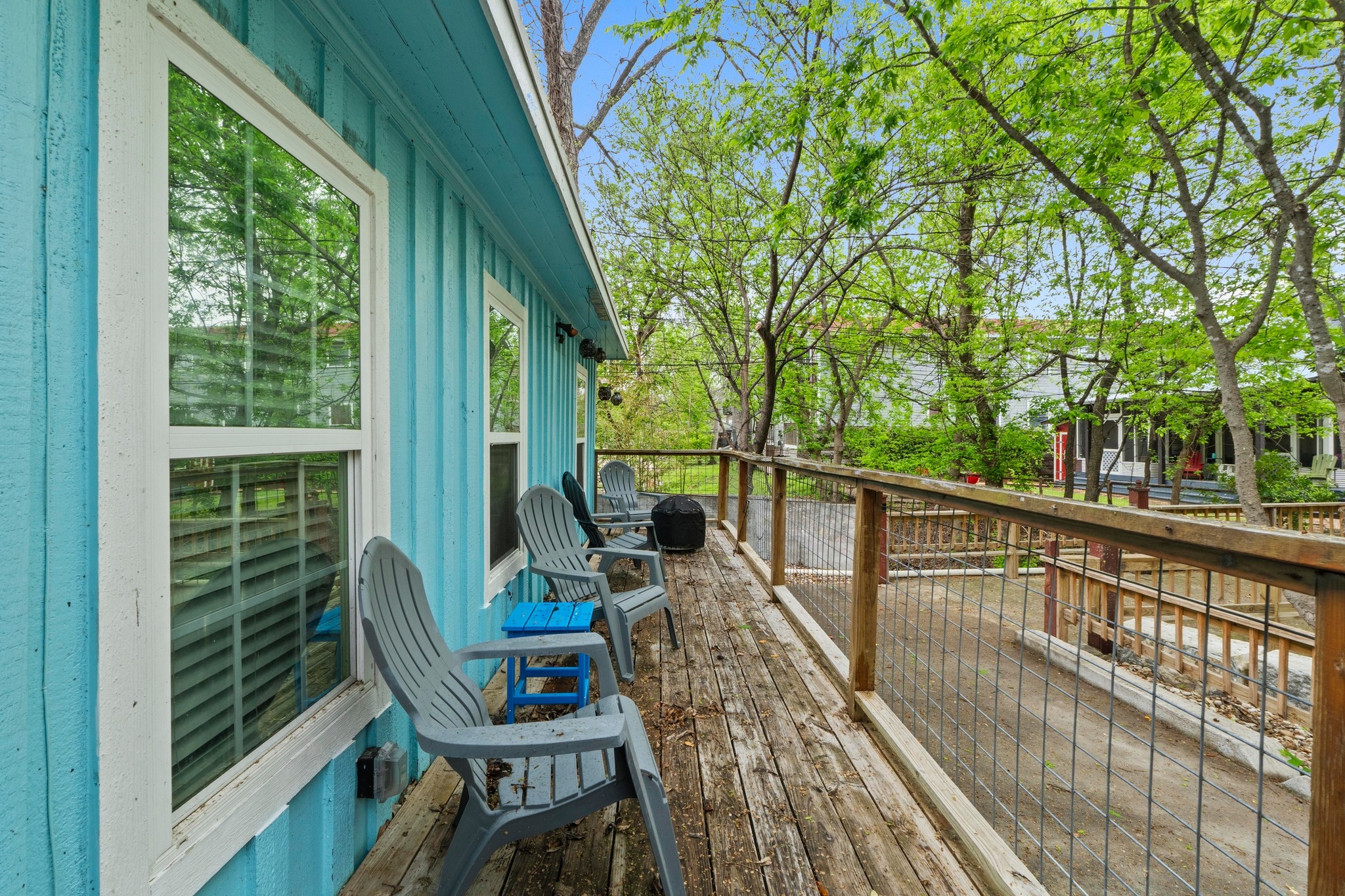 4512 Speedway, Unit A Austin, TX 78751 - Photo 38 of 39 Expansive outdoor deck featuring wood-finish flooring and a wood railing with wire infill