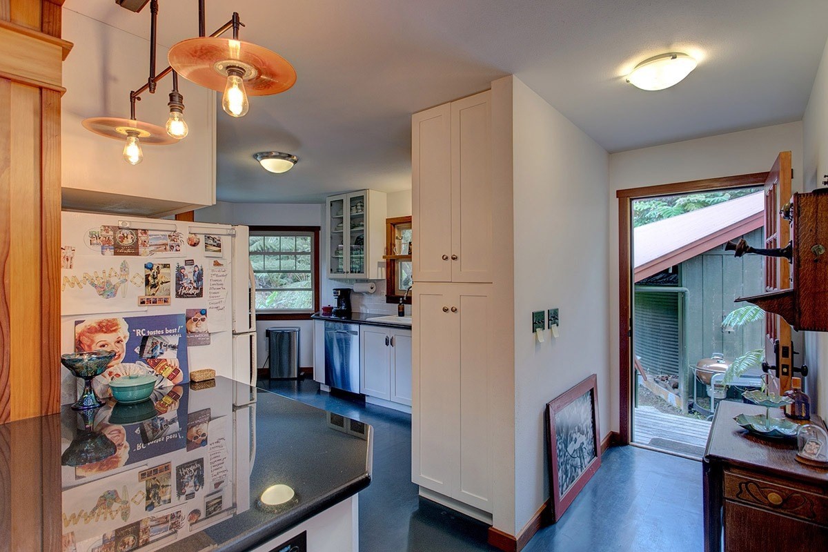 19-4242 Wright Road Volcano, HI 96785 - Photo 19 of 30 a dining room with furniture and wooden floor
