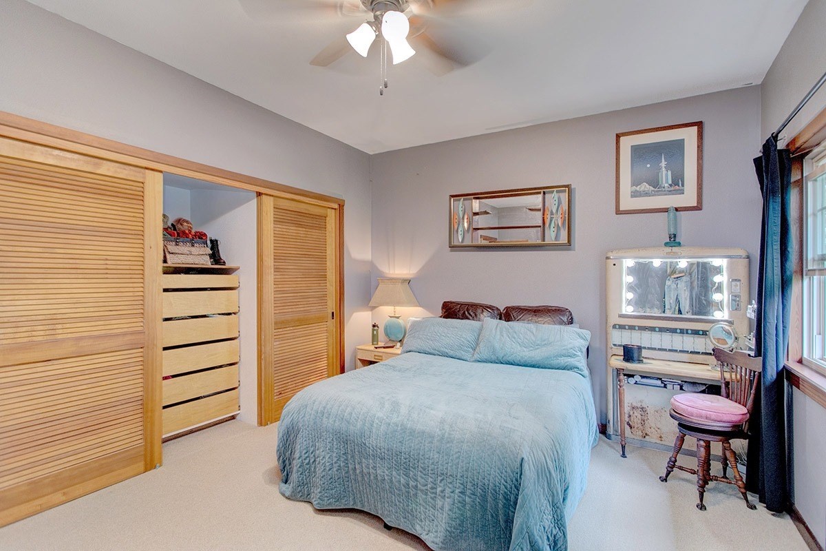 19-4242 Wright Road Volcano, HI 96785 - Photo 20 of 30 a bedroom with a bed and furniture