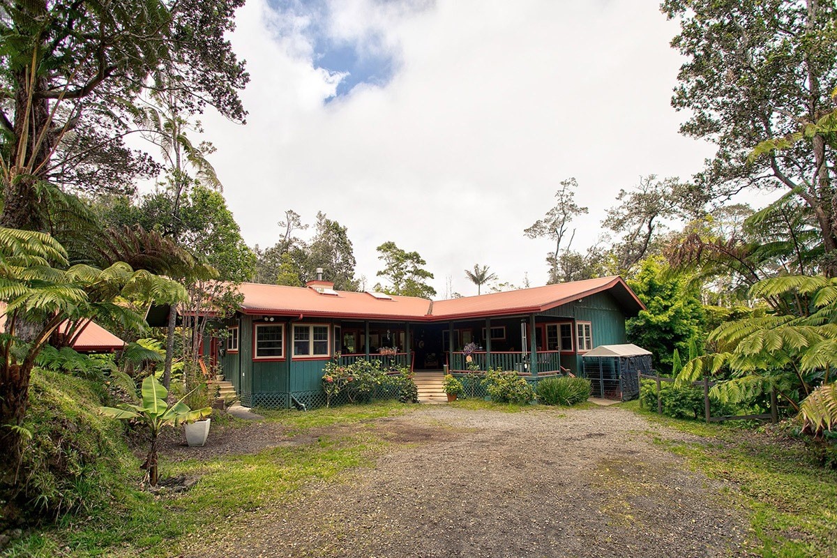 19-4242 Wright Road Volcano, HI 96785 - Photo 3 of 30 a front view of a house with a yard