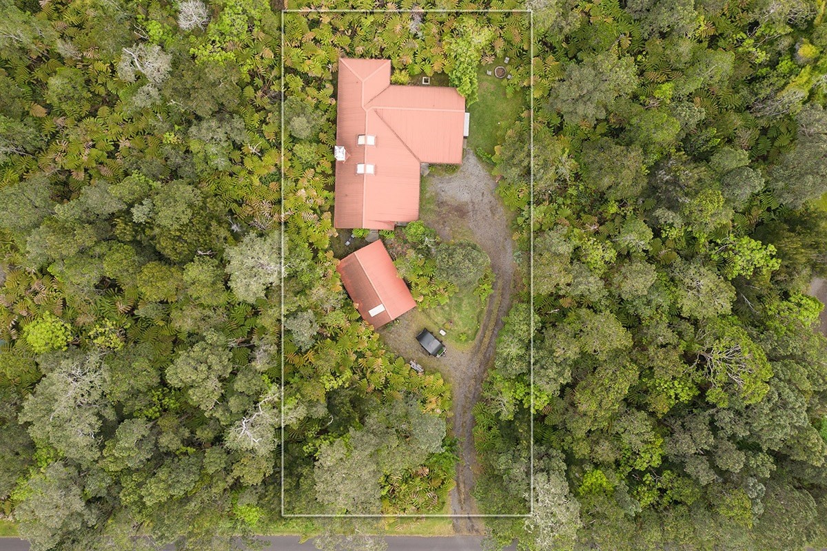 19-4242 Wright Road Volcano, HI 96785 - Photo 5 of 30 an aerial view of residential house with outdoor space and trees all around