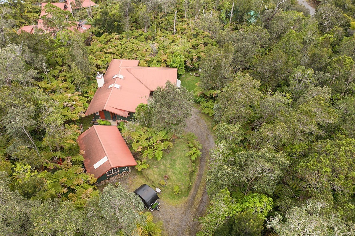 19-4242 Wright Road Volcano, HI 96785 - Photo 6 of 30 an aerial view of a house with swimming pool and garden