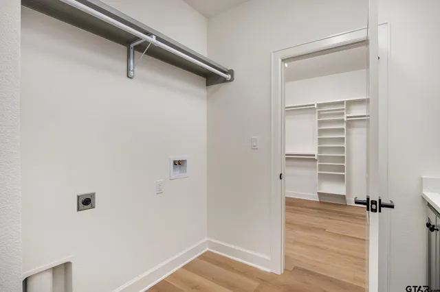 a view of a room with rack on the wall