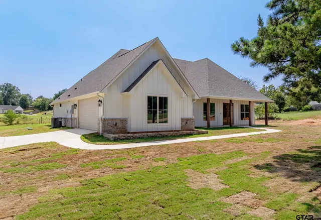 a view of a house with a patio