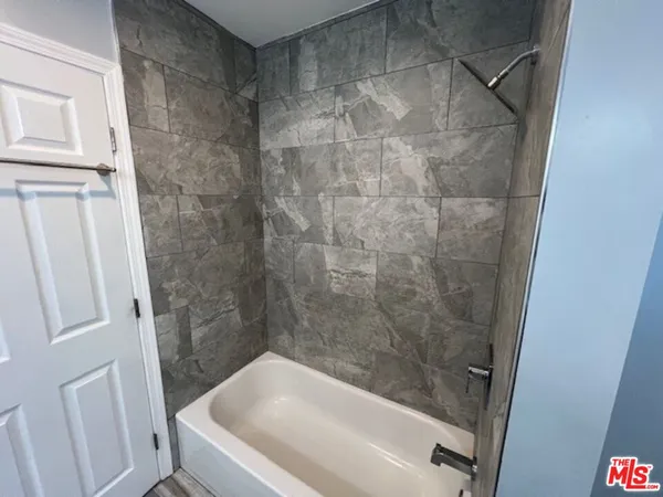 a bathroom with a bathtub
