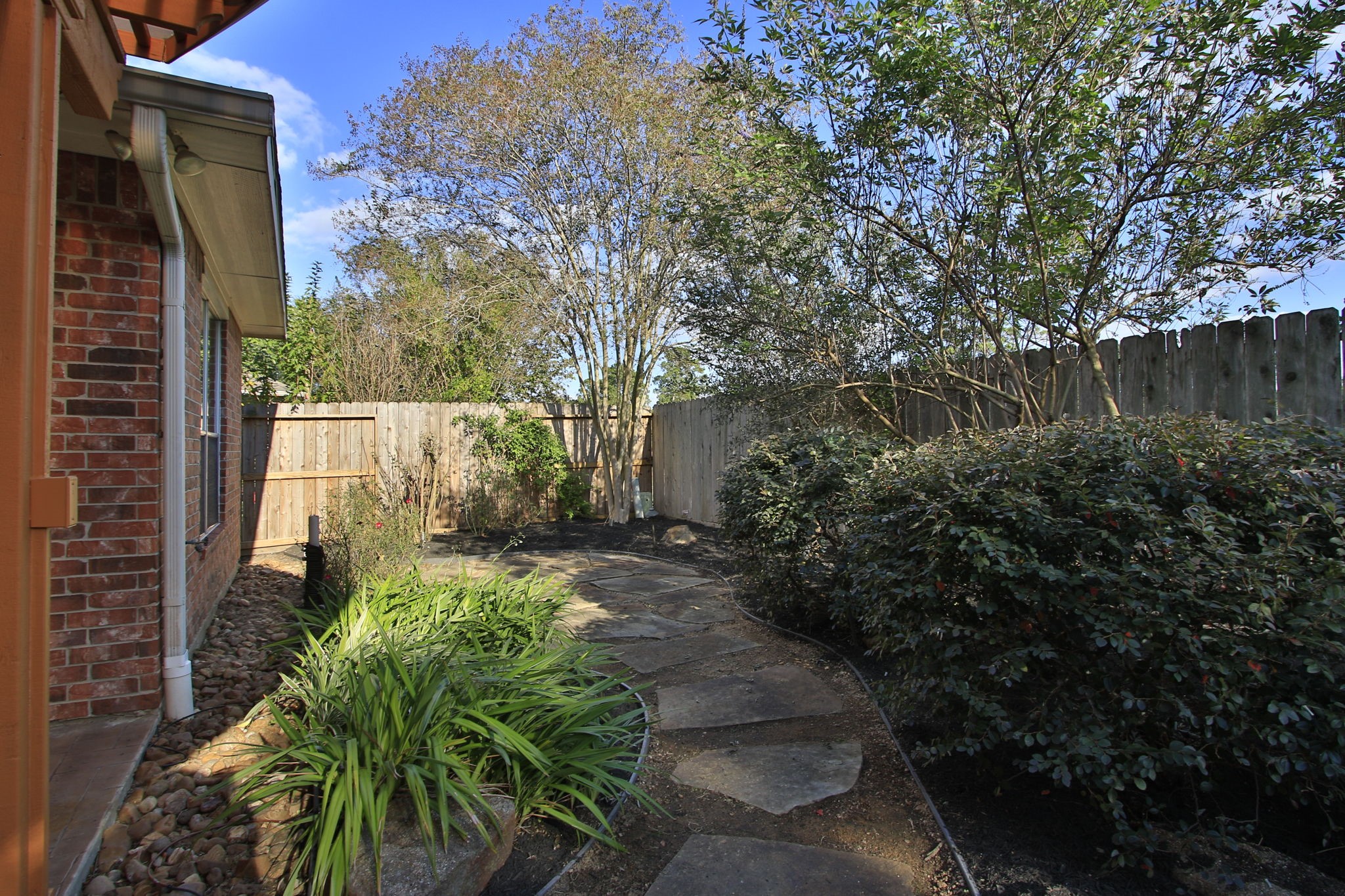 9203 Memorial Pines Way Spring, TX 77379 - Photo 44 of 45 One last view of this serene outdoor space ideal for relaxation or gardening.