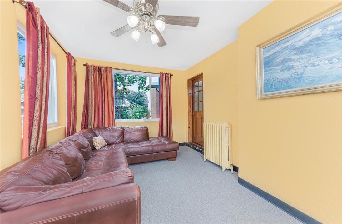 5650 Post Road Bronx, NY 10471 - Photo 16 of 34 a living room with furniture and a large window
