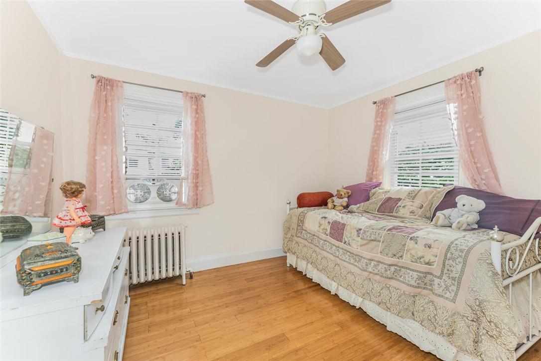 5650 Post Road Bronx, NY 10471 - Photo 24 of 34 a bedroom with a bed and a window