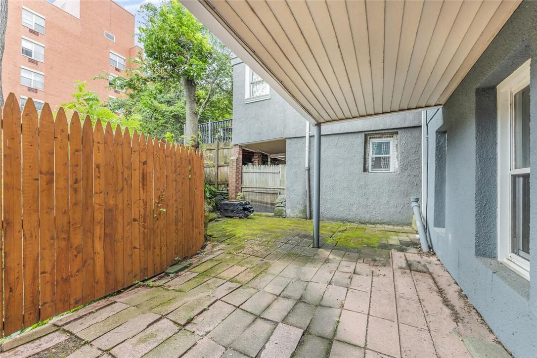 5650 Post Road Bronx, NY 10471 - Photo 29 of 34 a view of a house with a backyard