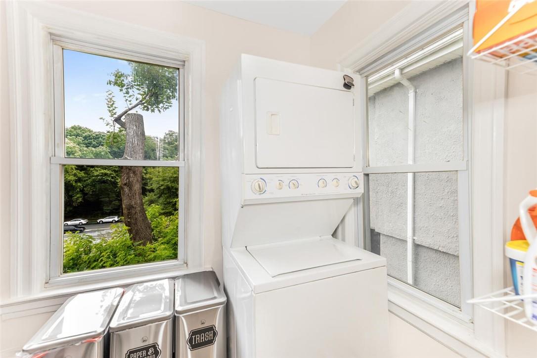 5650 Post Road Bronx, NY 10471 - Photo 8 of 34 a view of washer and dryer with bathroom in the background