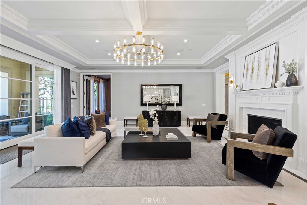 911 Hampton Road Arcadia, CA 91006 - Photo 25 of 73 a living room with furniture and a chandelier