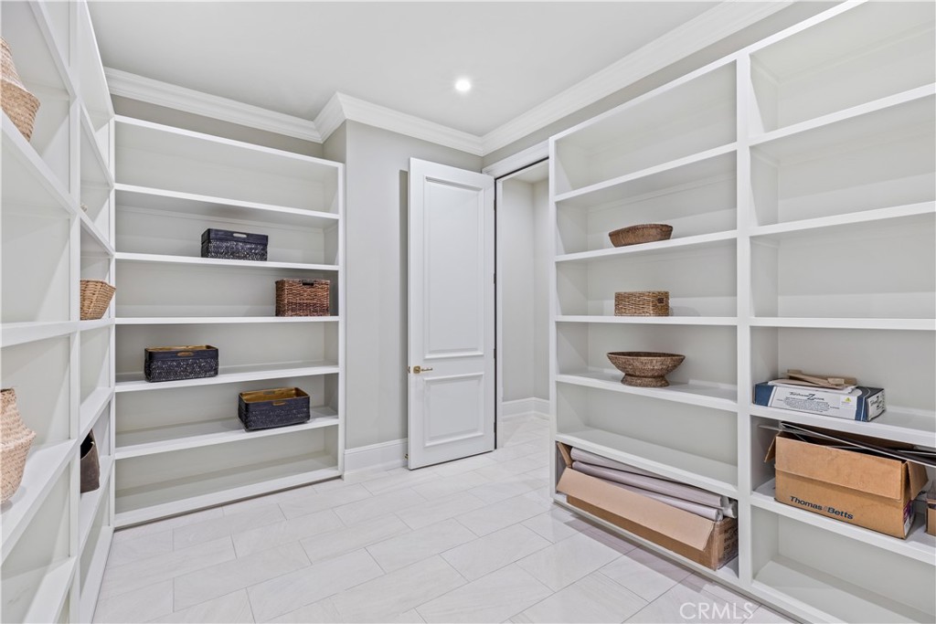 911 Hampton Road Arcadia, CA 91006 - Photo 31 of 73 a view of walk in closet with empty racks