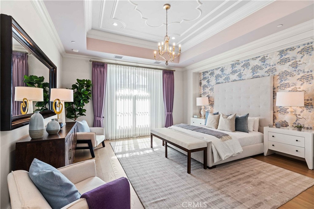 911 Hampton Road Arcadia, CA 91006 - Photo 37 of 73 a bedroom with a bed couch chandelier and a window