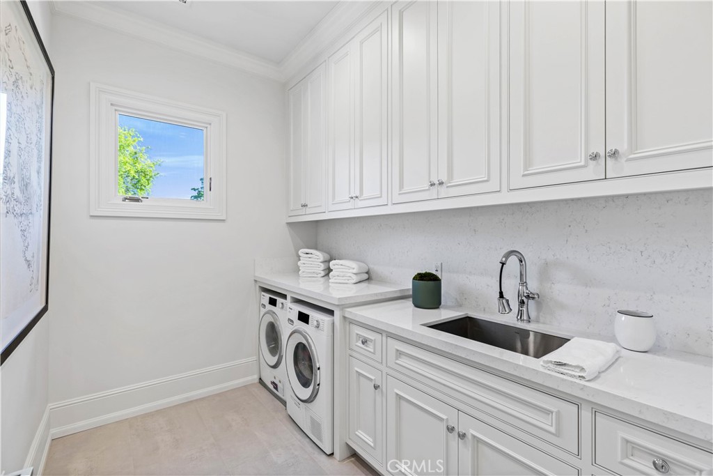 911 Hampton Road Arcadia, CA 91006 - Photo 38 of 73 a kitchen with stainless steel appliances granite countertop a sink a stove and a white cabinets