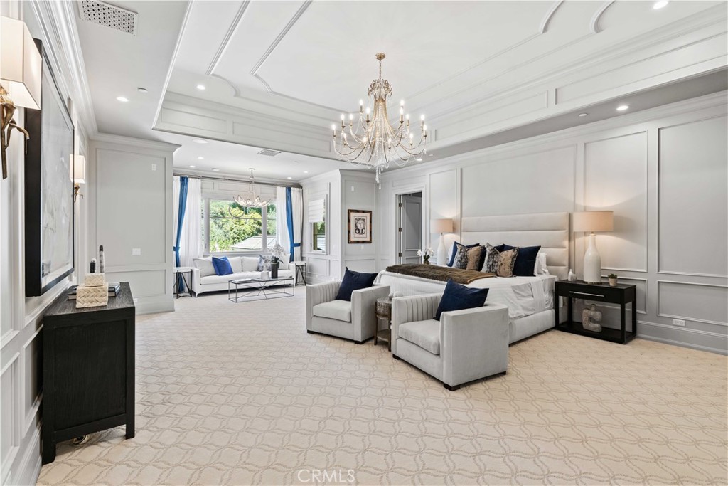 911 Hampton Road Arcadia, CA 91006 - Photo 45 of 73 a living room with furniture and a chandelier