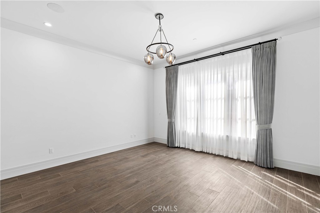 911 Hampton Road Arcadia, CA 91006 - Photo 56 of 73 wooden floor in an empty room with a window