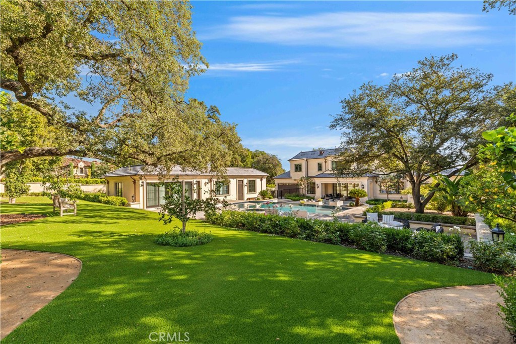 911 Hampton Road Arcadia, CA 91006 - Photo 60 of 73 a front view of a house with a garden