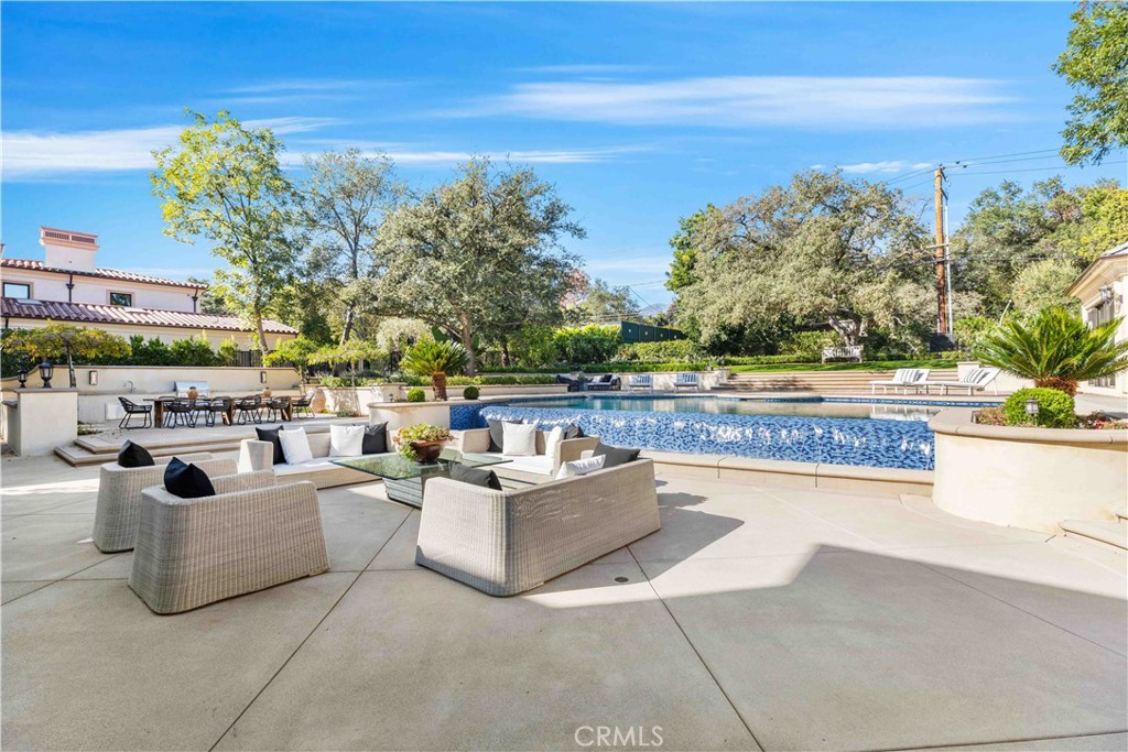 911 Hampton Road Arcadia, CA 91006 - Photo 62 of 73 a view of a swimming pool with seating space