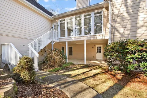 a view of a backyard of the house