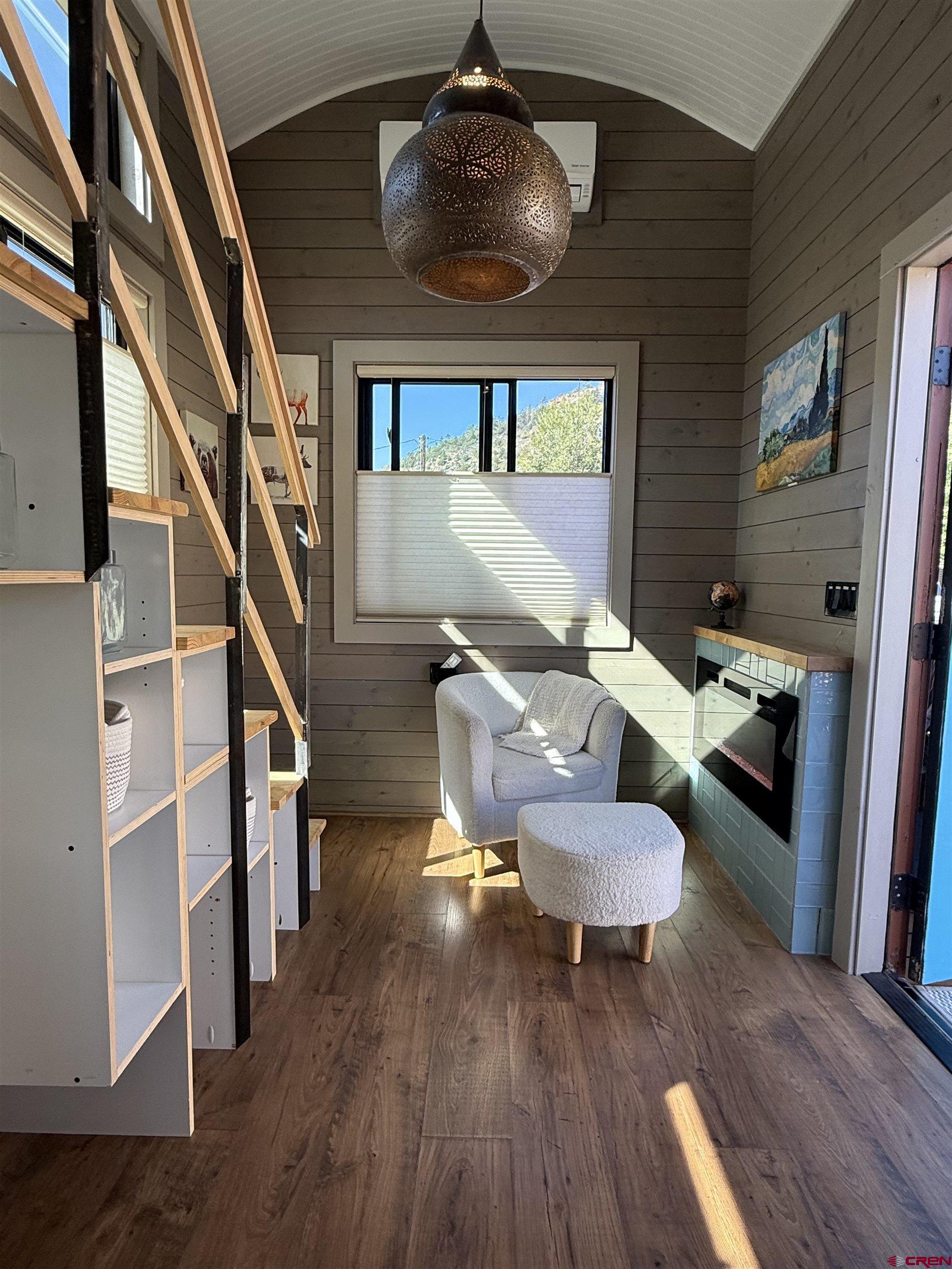 90 Animas View Drive, Unit 5 Durango, CO 81301 - Photo 12 of 30 a living room with furniture and a wooden floor