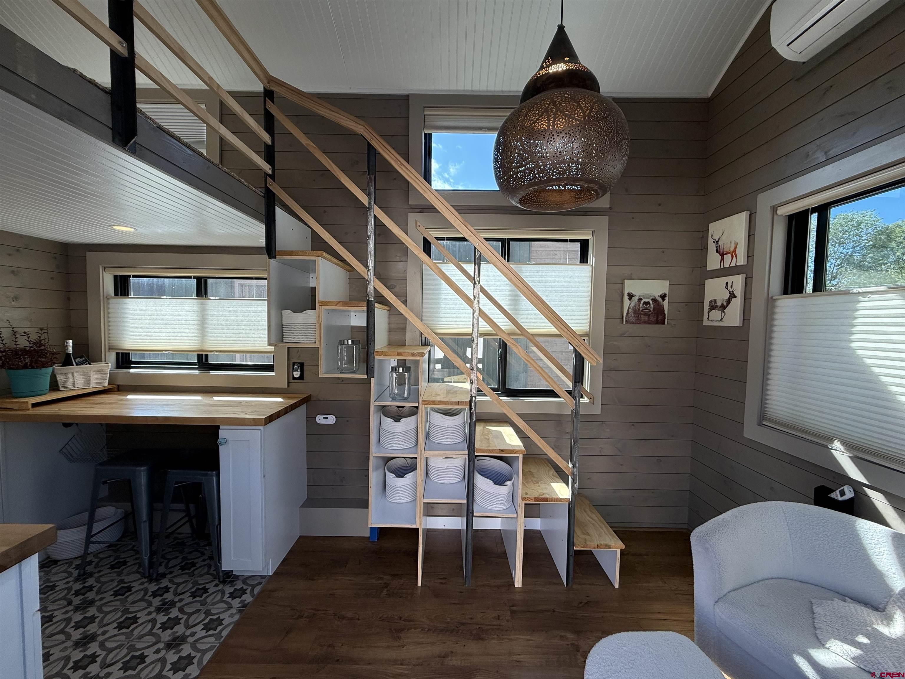 90 Animas View Drive, Unit 5 Durango, CO 81301 - Photo 13 of 30 a living room with furniture and a wooden floor